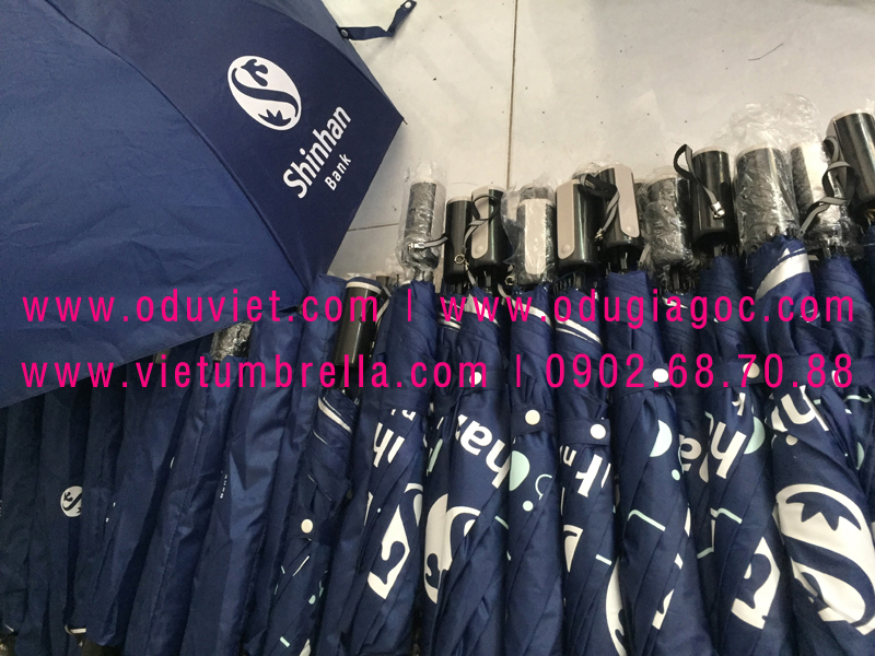 xưởng sản xuất ô dù cầm tay in logo quảng cáo
